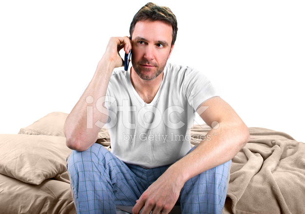 Man Receiving A Wake Up Call Or Text On Phone Stock Photo | Royalty ...