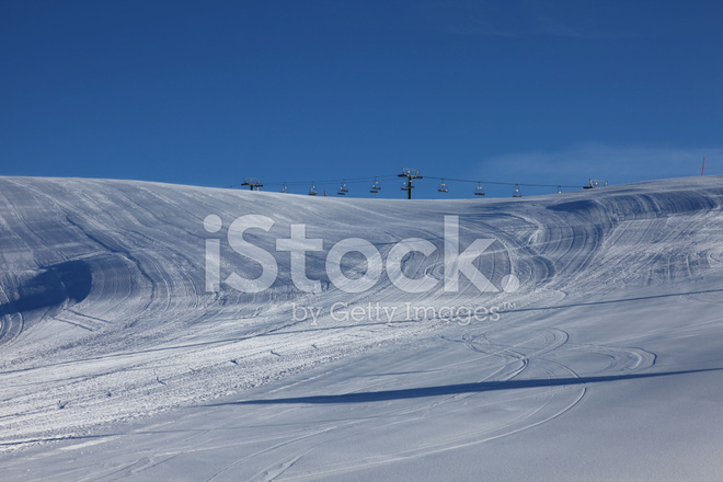 Groomed snow in ski resort