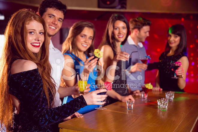 Happy Friends On A Night Out Together Stock Photo | Royalty-Free ...